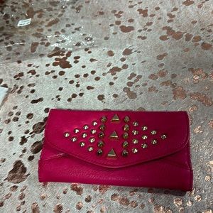 New in package fushia and gold wallet